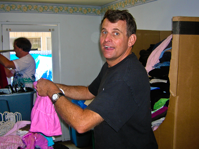 Man Organizing Clothes